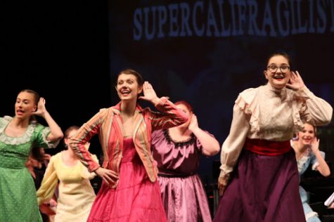 Izzy York, Jaylin Anders, and Lily Campbell, along with ensemble, perform Supercalifragilisticexpialidocious.