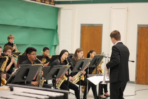 Jared VanVickle directs the second jazz band to start the night off 2019