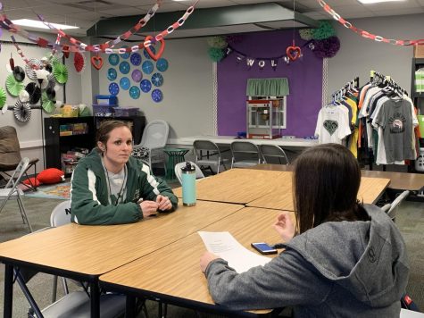 Ms. Newsome, the teacher of the year, being interviewed by Blaine Bruton.