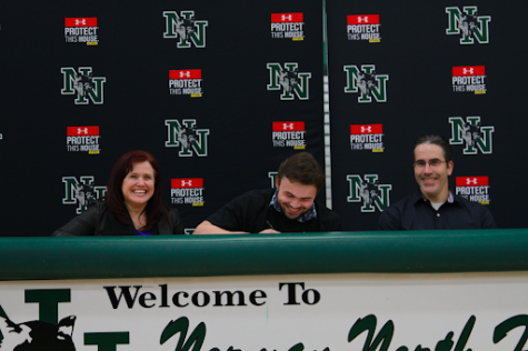 Blake Yohn celebrates with his parents as he continues his career in college.