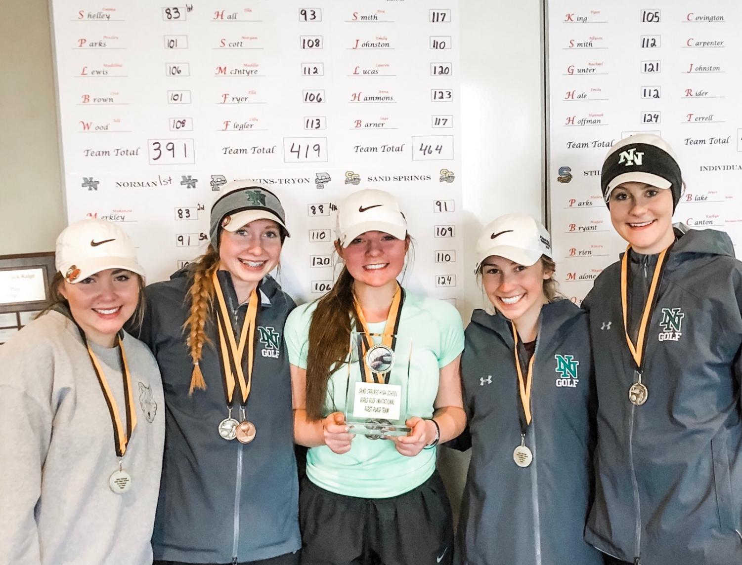 The girls with their medals at the Sand Springs tournament.