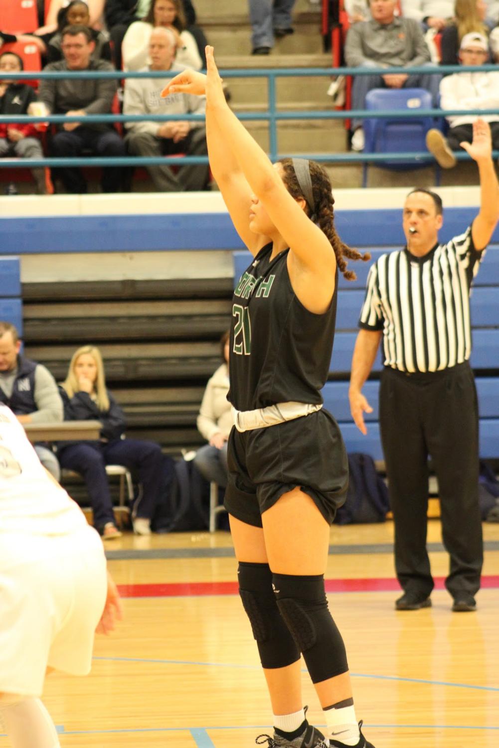 Jacie Evans shooting free throws in the first quarter.