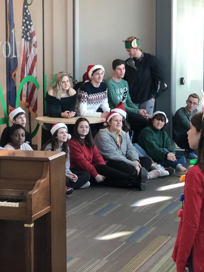 Jazz Choir at their annual Christmas Caroling to the office staff Dec. 2019.