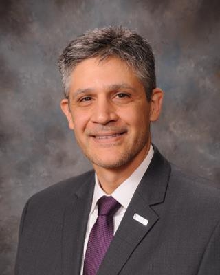 Dr. Migliorino, Superintendent of Norman Public Schools.