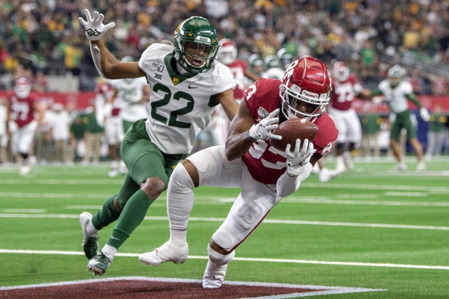 Nick Basquine (83) playing against Baylor for Big 12 Title.