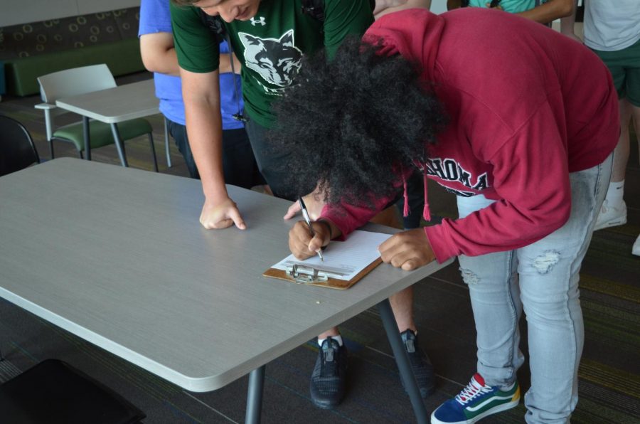 Students sign up for LifeSkills meetings in the morning. The meetings were well attended by the student body.