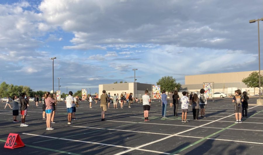 Marching band practices endlessly during marching season.  They also attend every football game.
