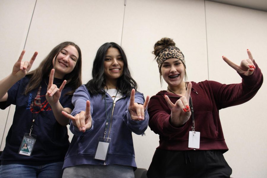 Joana Lopez, Alise Rojo, and Sarah Valasco pose for a picture before the February HALCC meeting where they taught about immigration and served delicious Salvadoran food.