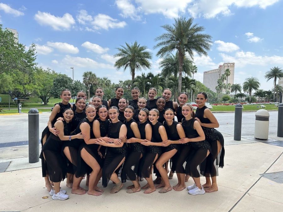 The pom girls pose for a photo that will be remembered by all of them.