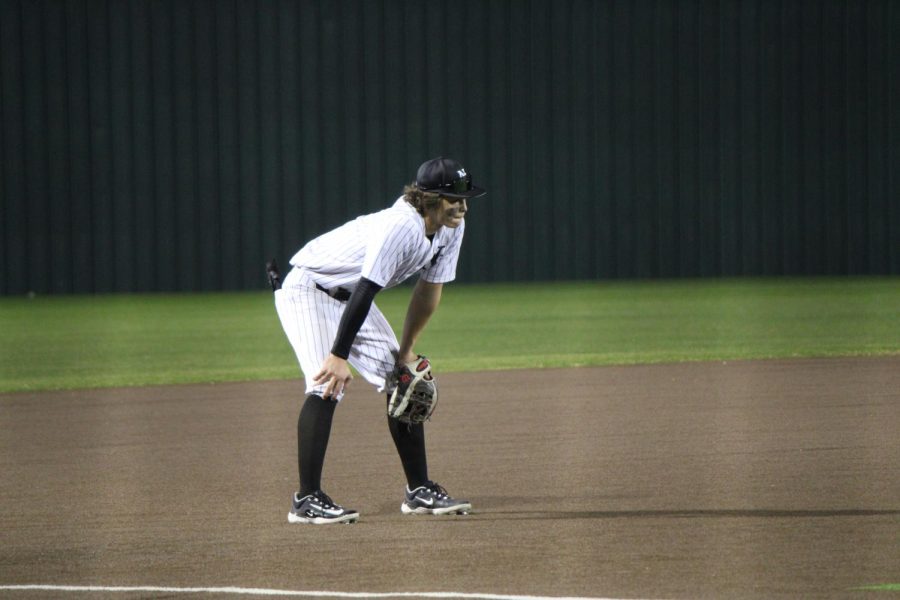 #10 Terry Pursell playing third base. 