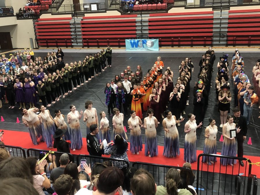 The Winter Guard Posing For a Photo At State Championships