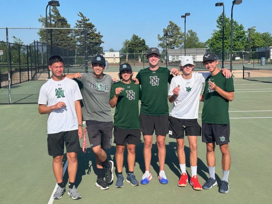 Boys+Varsity+Tennis+with+their+arrowheads+won+from+regionals+in+Mustang.